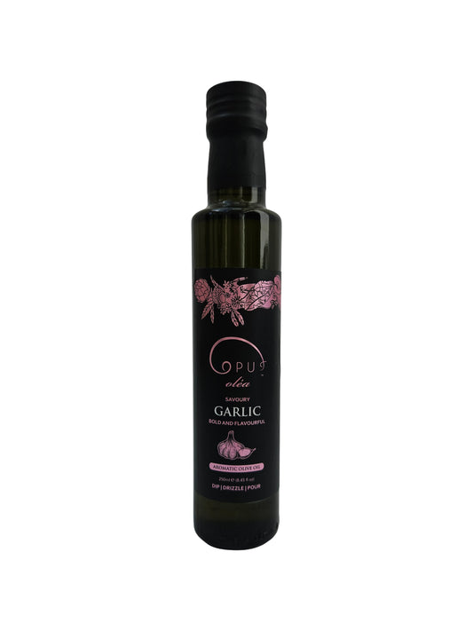 Bottle of Opus aromatic garlic olive oil on a white background
