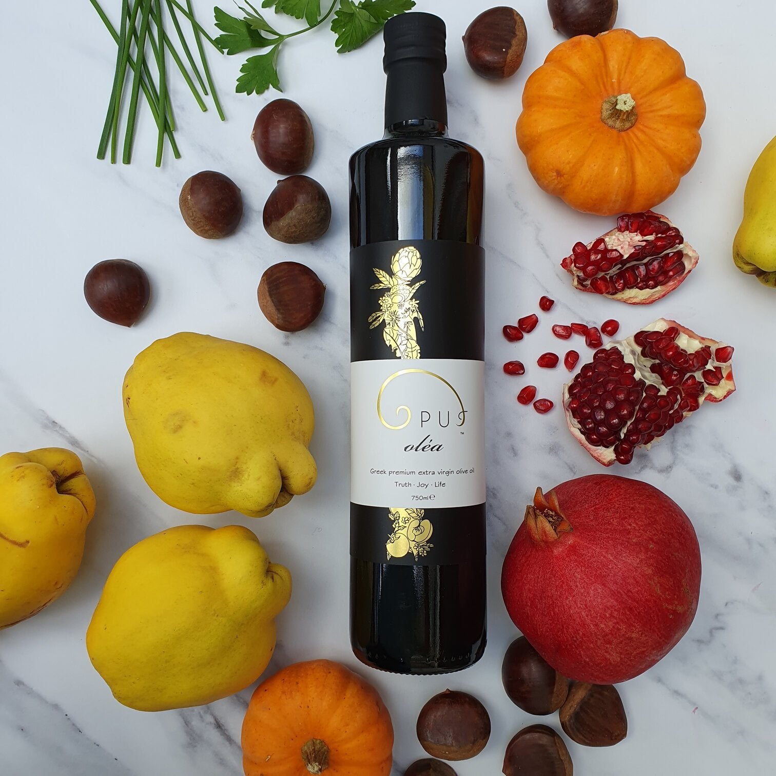 Opus olea organic olive oil with autumn pomegranate chestnut pumpkin quince fruit waitrose