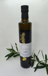 Opus oléa extra virgin olive oil in glass bottle with olive branch